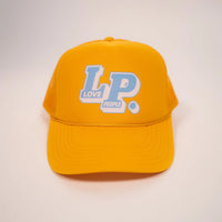 Yellow cap with 'LP' logo on a light gray background