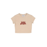 Beige t-shirt with 'love people.' text on a white background